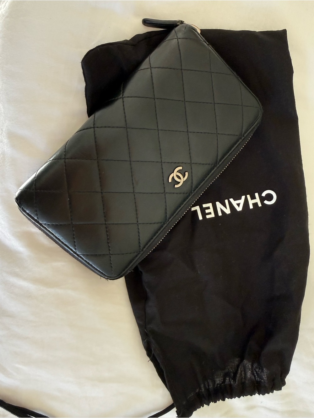 CHANEL Black Quilted Zip-Around Wallet with Silver CC